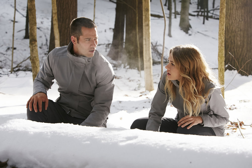 KILLJOYS -- "Heart-Shaped Box" Episode 207 -- Pictured: (l-r) Luke Macfarlane as D"Avin, Tori Anderson as Sabine -- (Photo by: Ian Watson/Syfy/Killjoys II Productions Limited)