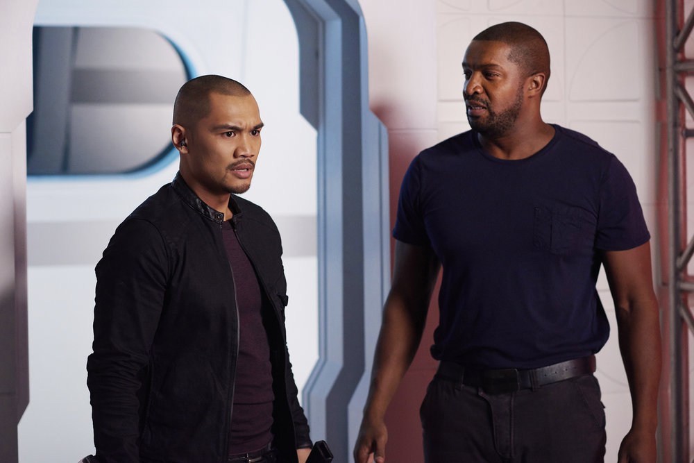 DARK MATTER -- "Going Out Fighting" Episode 209 -- Pictured: (l-r) Alex Mallari Jr. as Four, Roger Cross as Six-- (Photo by: Russ Martin/Prodigy Pictures/Syfy)