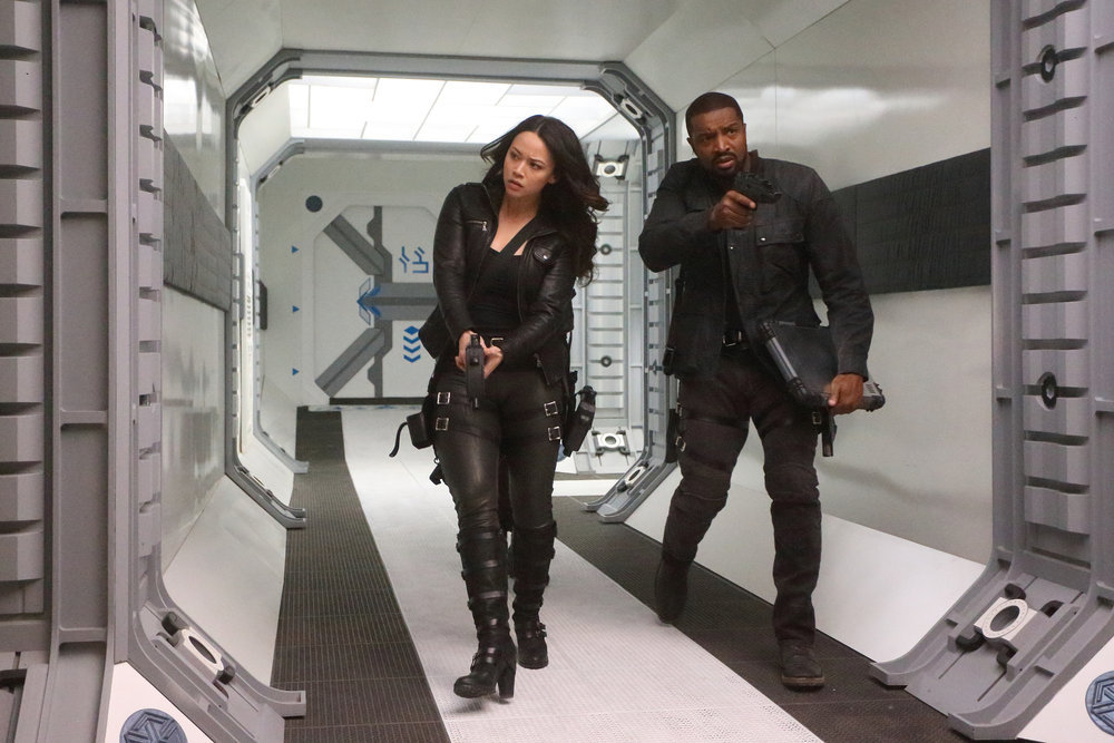 DARK MATTER -- "It Doesn't Have To Be Like This" Episode 302 -- Pictured: (l-r) Melissa O'Neil as Two, Roger Cross as Six -- (Photo by: Stephen Scott/Dark Matter Series 3/Syfy)