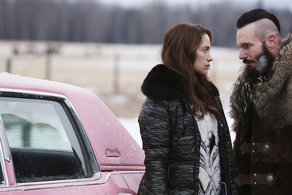 WYNONNA EARP -- "Bury Me With My Guns On" Episode 109 -- Pictured: (l-r) Melanie Scrofano as Wynonna Earp, Michael Eklund as Bobo Del Ray -- (Photo by: Michelle Faye/Syfy/Wynonna Earp Productions)